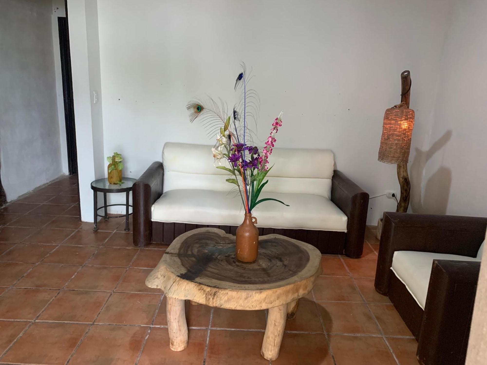 Casa Caribe 坎昆 外观 照片 A living room in a typical house in the community